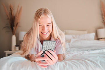 Relax, smile or woman on bed, smartphone or typing for social media, connection or break. Female, girl or person with cellphone, mobile app or communication with network signal or chatting in bedroom