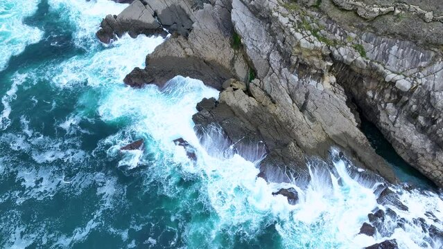 Coastal landscape of cliffs, meadows and sea in the area of Punta Ballota between Tagle and Ubiarco. Aerial view from a drone. Cantabrian Sea. Cantabria, Spain, Europe
