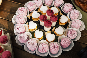Sweet table. Holiday food with different delicious sweets.