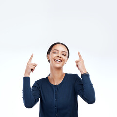 Studio mockup, portrait and happy woman pointing up at sales promotion, advertising space or discount deal mock up. Brand commercial, marketing gesture or product placement female on white background