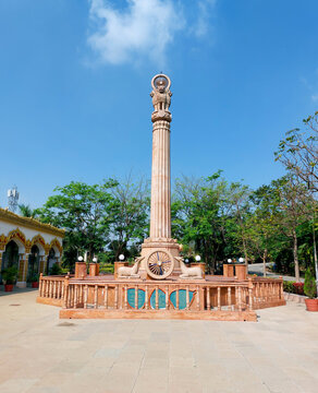 Ashoka chakra stambh(pillar) standing tall signifying power, courage, confidence and pride mounted on a circular base