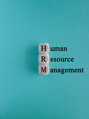 HRM, Human resource management symbol. Words HRM, Human resource management symbol on cubes on a...