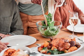 Lunch table, family and dishing food, eating dinner or celebrating together. Salad, hungry and people dining with gourmet dishes, enjoying homemade cooking and sharing cuisine during supper at home