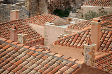 Monemvasia - roofs and chimneys of tenement houses from Byzantine times in Monemvasia in Peloponnese (Greece)