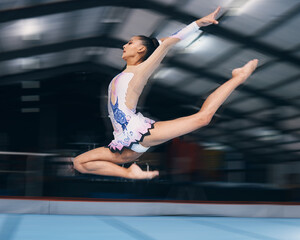 Woman, gymnastics and jump in motion blur for performance, flexible skill and dancer. Female,...