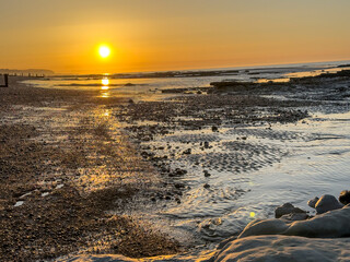Sunrise at low tide at Bexhill, East Sussex, England