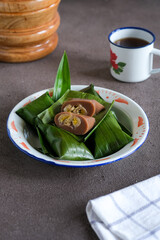 kue nagasari or mungbean flour banana cake
