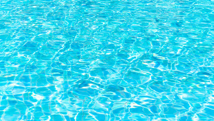Water swimming pool background with texture surface pattern of blue turquoise ripple wavy water reflection of natural aqua wave on the outdoor summer holiday vacation pool