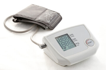 tonometer and pulse oximeter on white background