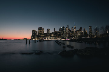 Fototapeta na wymiar Night time on the Hudson: A Stunning Manhattan Sunset from the Pier