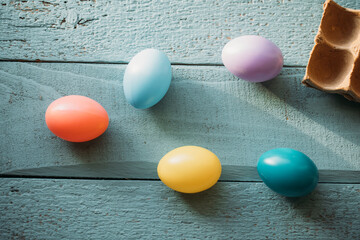 Fototapeta na wymiar easter eggs on a wooden background