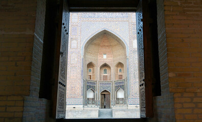 Doors of the madrasah in Bukhara