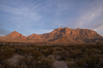 Fototapeta na wymiar Clouds over mountains in desert mountains 