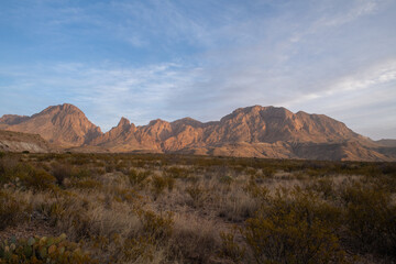Clouds over mountains in desert mountains 