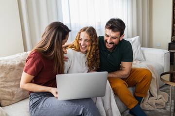 Family of three feeling excited about a new family trip they just booked online.