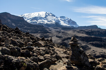 Scenery, rock piles and hiking trail on the slope of Mount Kilimanjaro