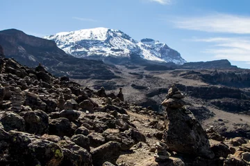 Papier Peint photo autocollant Kilimandjaro Scenery, rock piles and hiking trail on the slope of Mount Kilimanjaro