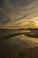 Sky reflected in tidal pond