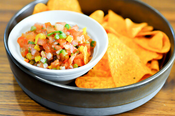 nachos, Nachos Cheese or Mexican snacks with tomato salad
