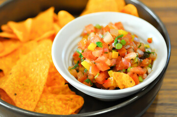 nachos, Nachos Cheese or Mexican snacks with tomato salad