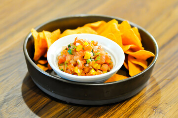 nachos, Nachos Cheese or Mexican snacks with tomato salad