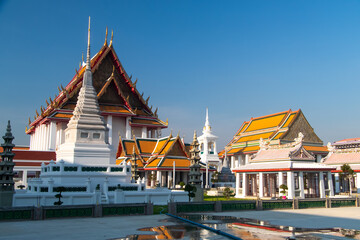 Details of Buddhist temple in Bangkok under blue sky