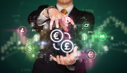 Businessman holding currency symbols concept