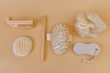 Various eco frendly items from bathroom for face and body care and hygiene on beige background with Copy space. Zero waste concept. Minimal flat lay. Top view.