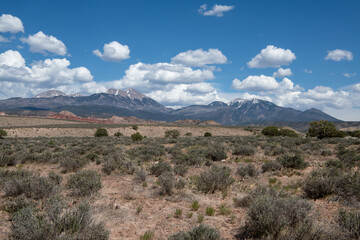 Fototapeta na wymiar Clouds over mountains in desert