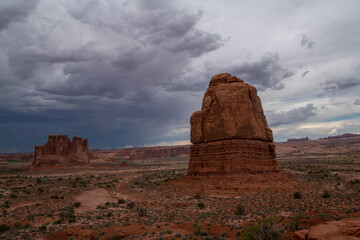 Fototapeta na wymiar Clouds over unique desert formations in Utah Canyons