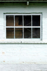 Fototapeta premium Brick wall of a building with window