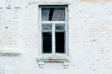 Fototapeta na wymiar Brick wall of a building with window