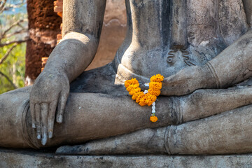 Detail of Buddha statue in Sukhothai Historical Park, Thailand