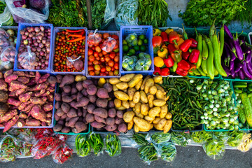 Colourful fruit and vegetables in market stall Thailand
