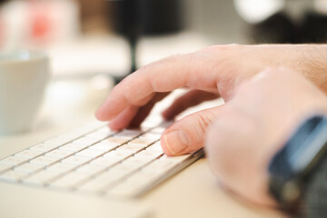 Typing on keyboard in office