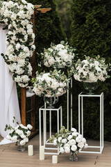 Trendy decor for wedding ceremony. Part of the festive decor, floral arrangement.