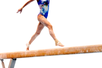 Zelfklevend Fotobehang legs female gymnast exercise balance beam gymnastics on transparent background, olympic sports included in summer games © sports photos