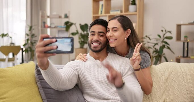 Couple, selfie and living room sofa with a kiss and happiness in a home. Happy, love and care in a house lounge on a couch taking a profile picture for social media and a smile feeling romantic