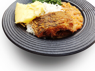 close up at on fried fish at on Typical Brazilian daily meal called 