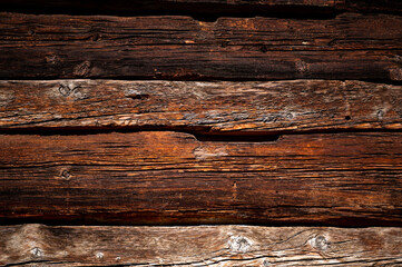 old wood pattern with strong carves and texture in red brown colorful