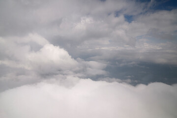 Clouds background. Flying into the clouds.