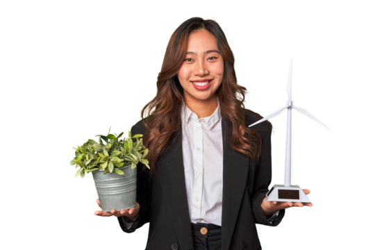 A powerful Chinese businesswoman holds a thriving plant and a windmill model, symbolizing her commitment to sustainable and responsible business practices.