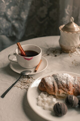 morning cup of coffee with croissant 