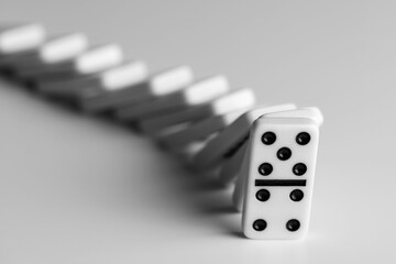 simple classic domino tiles in white on a light background
