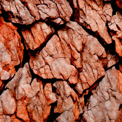 A red rock wall with the word rock on it background