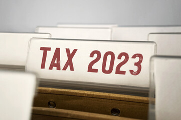 Filing folders with word Tax 2023