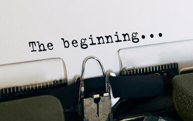 Text The beginning typed on retro typewriter