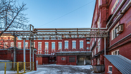 Fototapeta na wymiar Industrial buildings of an old red brick factory in Moscow