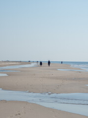 Fototapeta na wymiar people walking on Westerland beach, Sylt