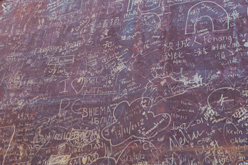 Writings on a rusty gate - graffiti concept background